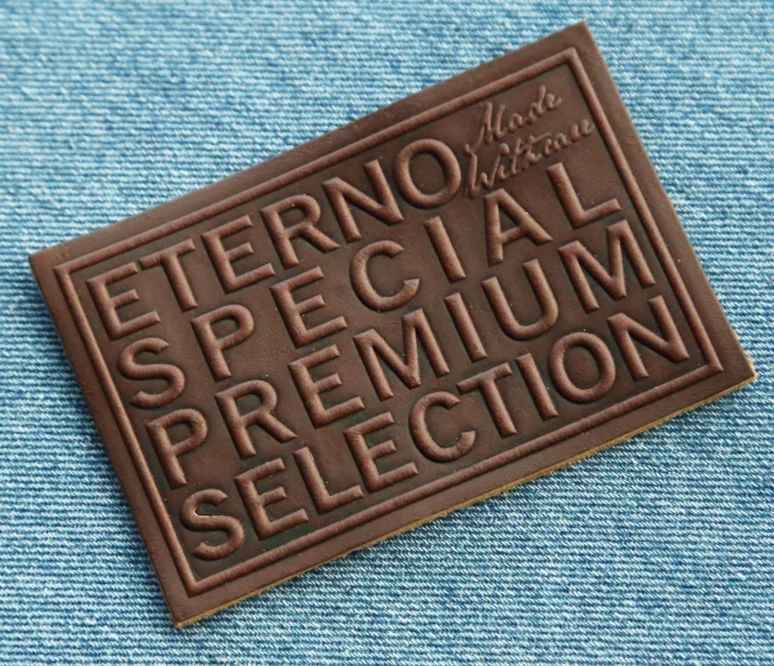 Cheap private jeans custom embossed fashion design leather patch labels