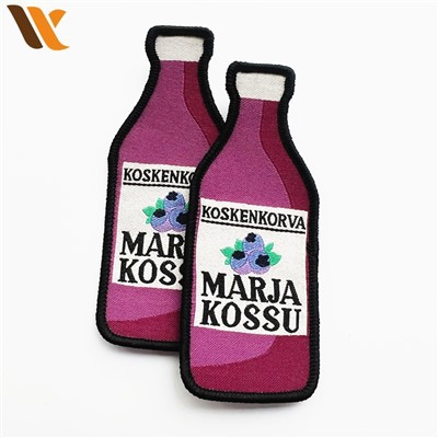 Vävd Patch I Form Av En Juiceflaska